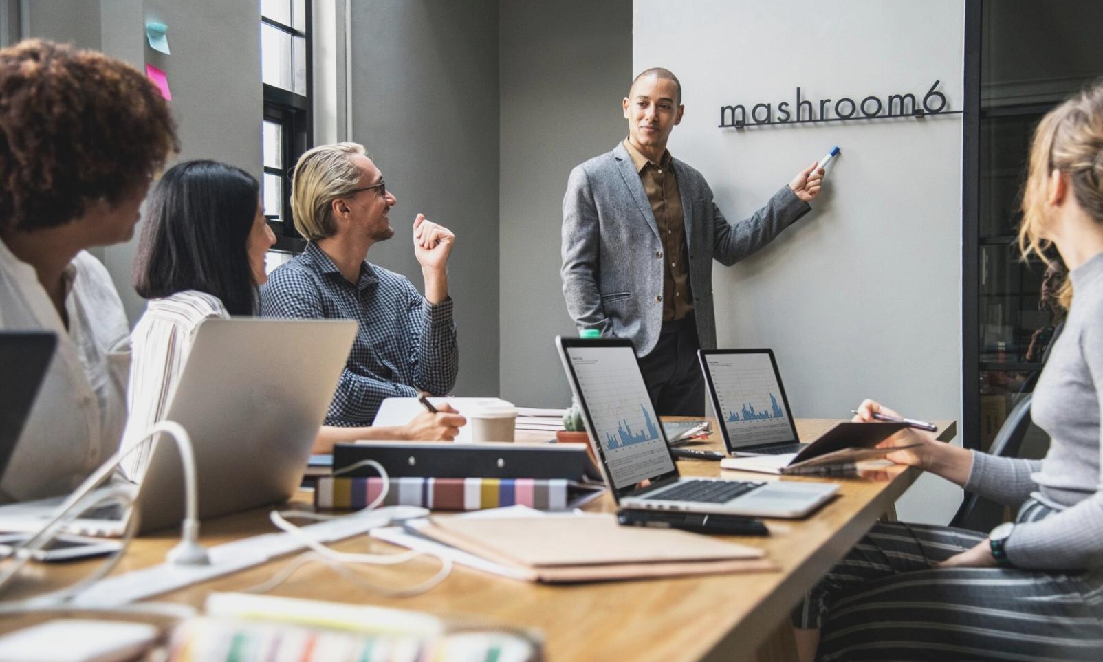 Financial planning meeting with business documents and charts